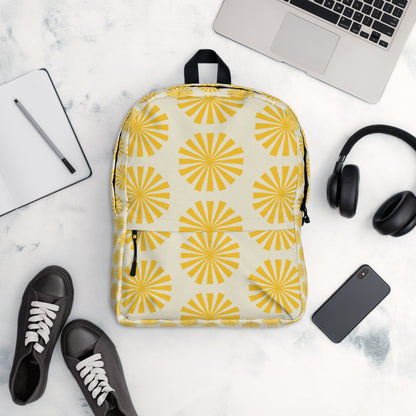 Sunburst yellow backpack with retro geometric pattern on white background